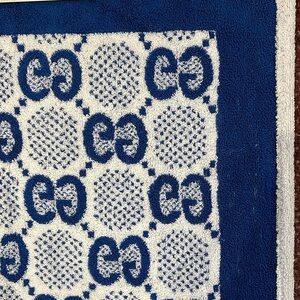 Blue and White Patterned Rug